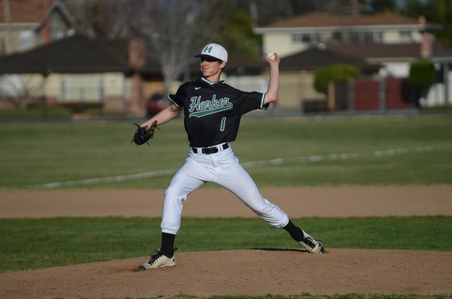 Anthony+Meissner+%2811%29+pitches+against+Prospect+High+School.+The+baseball+team+won+3-1.+