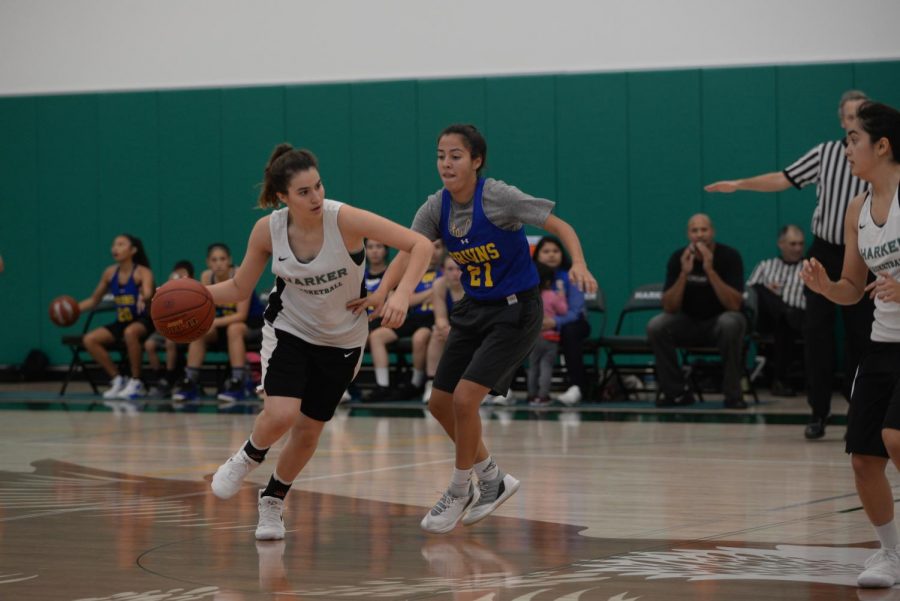 During+a+scrimmage+against+Santa+Clara+High+School%2C+Selin+Sayiner+%2812%29+dribbles+the+ball+while+avoiding+an+opposing+defender.+The+girls+team+qualified+for+CCS+in+their+preseason.+