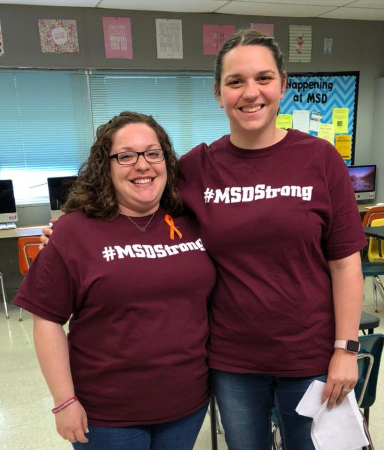Journalism+teacher+Melissa+Falkowski+poses+with+a+colleague+in+an+%23MSDStrong+T-shirt.+Falkowski+teaches+English+and+advises+the+newspaper+at+MSD+and+has+been+teaching+at+the+school+for+13+years.