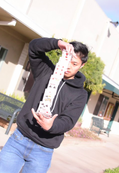 Junior Christopher (Chris) Gong demonstrates an illusionary magic trick involving cards. Chris also auditioned for the Hoscars talent show as part of a dance act. 