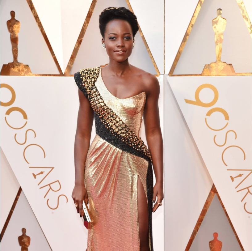 Lupita Nyong’o presents the 2018 Oscars. She and Kumail Nanjiana made political statements by introducing themselves as immigrants and speaking about their dreams to reach Hollywood. 