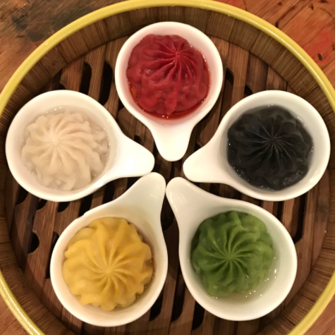 Five Guys XLB is a dish with soup dumplings of five different flavors: natural flour skin juicy pork, beets skin fresh beets, squid ink skin black truffle, spinach skin kale and turmeric skin crab roe. Five Guys XLB is one of Koi Palaces most famous dishes.