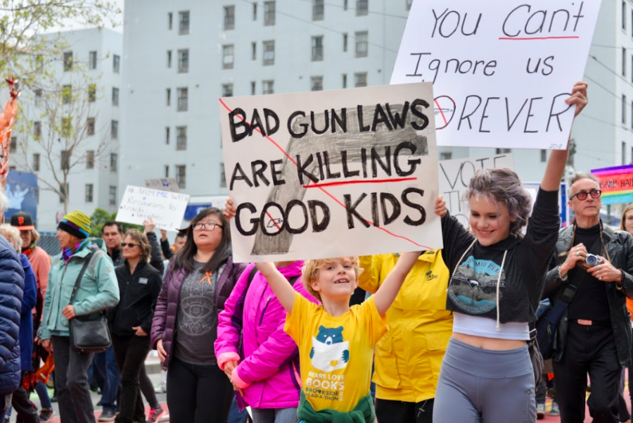 Siblings sport signs advocating for safer gun control policies. Protesters of all ages gathered in march locations across the country on March 23rd to speak out against the gun epidemic.