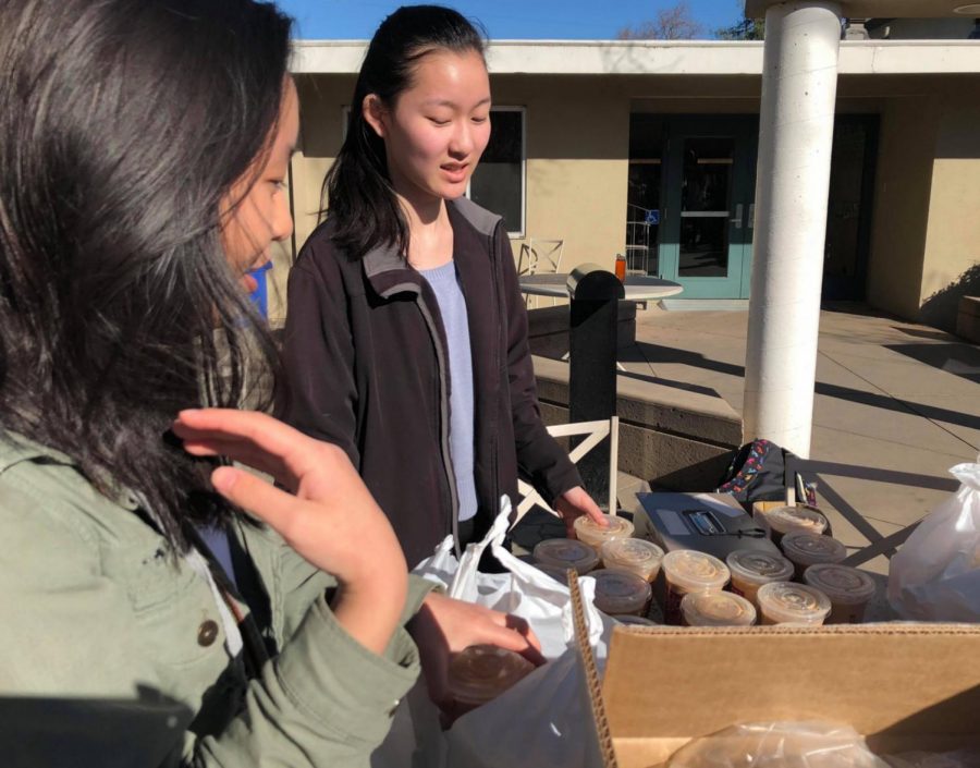 Technology Student Association members Cat Zhao (10) and Anna Wang (11) set up Fantasia pearl milk tea tables outside Manzanita. All proceeds from sales will go towards expenses for the TSA California State Conference, which members of the club will be attending from March 24 to 25 in Bakersfield.