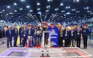 The Harker Robotics Team poses next to their robot after winning the Roebling subdivision. The FIRST Robotics Competition took place from Apr. 18 to 21 in Houston, Texas. 