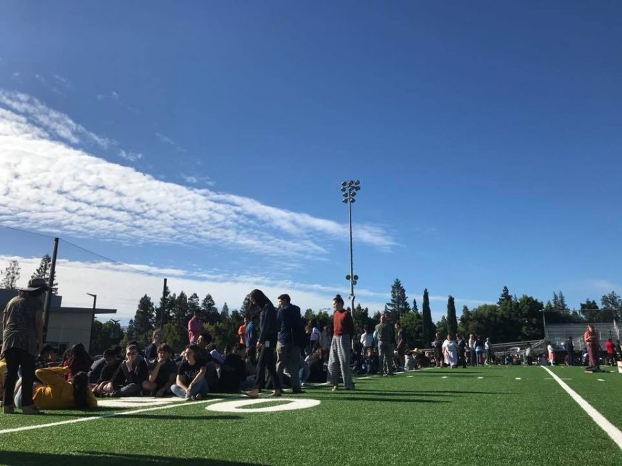Students gather on Davis Field for an emergency evacuation drill today. The drill was announced at school meeting Monday.