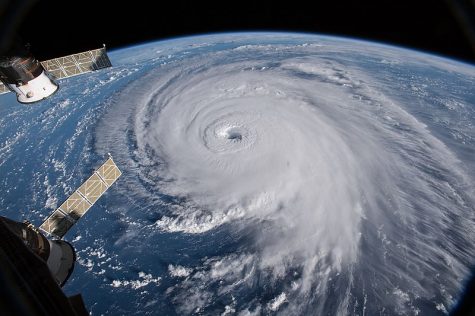 Hurricane Florence is seen from the International Space Station on Sept. 12, when it was classified as a Category 3 hurricane. The hurricane has led to at least 48 deaths in North Carolina, South Carolina, Florida and Virginia, many due to the widespread storms and flooding it caused.