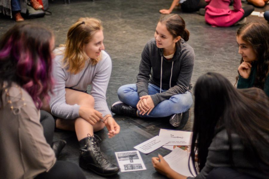 Nellie Tonev (11) and Maya Franz (10) discuss ideas for a storytelling exercise during a workshop at the Oregon Shakespeare Festival this weekend. A group of 28 students and four teachers travelled to Ashland, Oregon, on Friday and returned to San Jose on Sunday night.