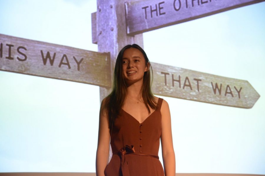 Alycia Cary (12) gives a talk about how to view the fear of ambiguity and categorical thinking at TEDx on Saturday. Senior speakers are chosen after a process of filling out an application about their interests and being interviewed by the TEDx team.
