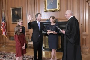 The newly confirmed 114th Supreme Court Justice Brett Kavanaugh takes the Constitutional Oath, administered by Chief Justice John Roberts, accompanied by Kavanaughs wife, Ashley Estes Kavanaugh, and his two daughters, Liza and Margaret. The Senate confirmed Kavanaughs nomination in a 50-48 today.