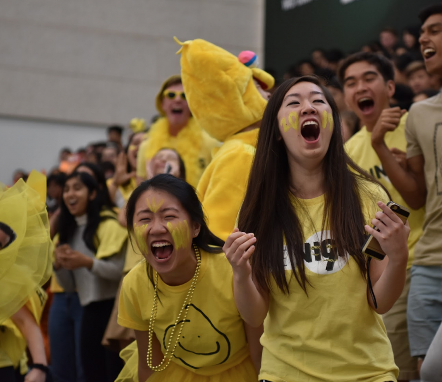 Seniors Kelsey Wu and Shania Wang cheer during the student-teacher dodgeball game. This game took place after the spirit parade on Oct. 3.