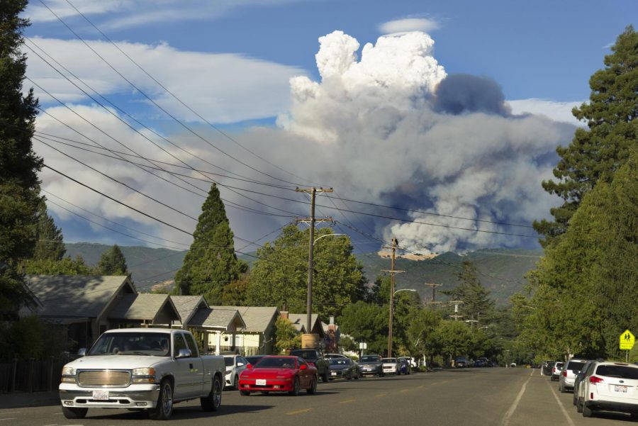 Billows of smoke rise from a forested mountainside over the city of Ukiah in Mendocino County. The Mendocino Complex Fire, which spanned across four northern California counties, was the largest recorded complex fire in Californias history.
