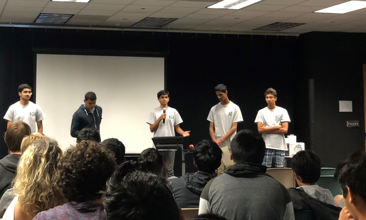 Nakul Bajaj (11) speaks during HarkerHacks with fellow officers Rohan Sonecha (11), Arnav Joshi (11), Arjun Akkiraju (11), and Arun Sundaresan (11). HarkerHacks 2018 took place from June 9 - 10 at 42 Silicon Valley.