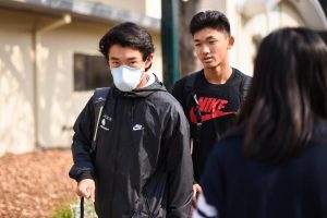 Daniel Wu (9) wears a mask to protect from the unhealthy air quality today during lunch.