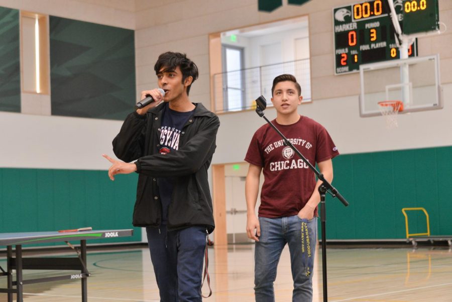 Spirit club officers Arjun Kilaru (12) and Zachary Hoffman (12) announce the results of the costume contests from Wednesday. Each winner received prizes as well as spirit points for their class.
