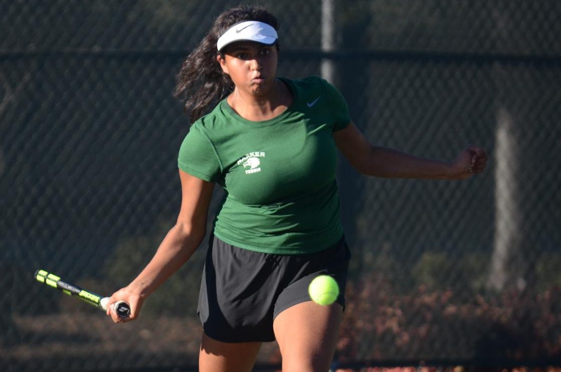 Singles player Santoshi Tirumala (10) prepares to hit the ball. Santoshi, along with doubles partners Gina Partridge (11) and Amanda Cheung (11), fell in Monday's quarterfinals.