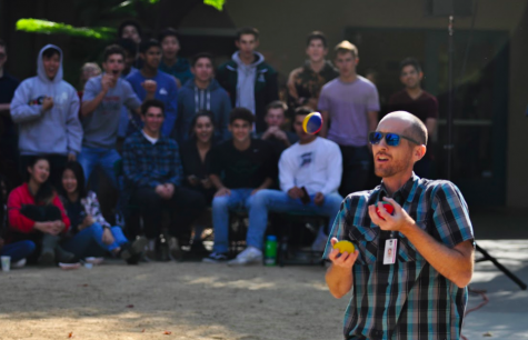 Staff photographer Mark Kocina performs his juggling act during Quadchella on Thursday.  The song Take On Me by a-ha accompanied his act.
