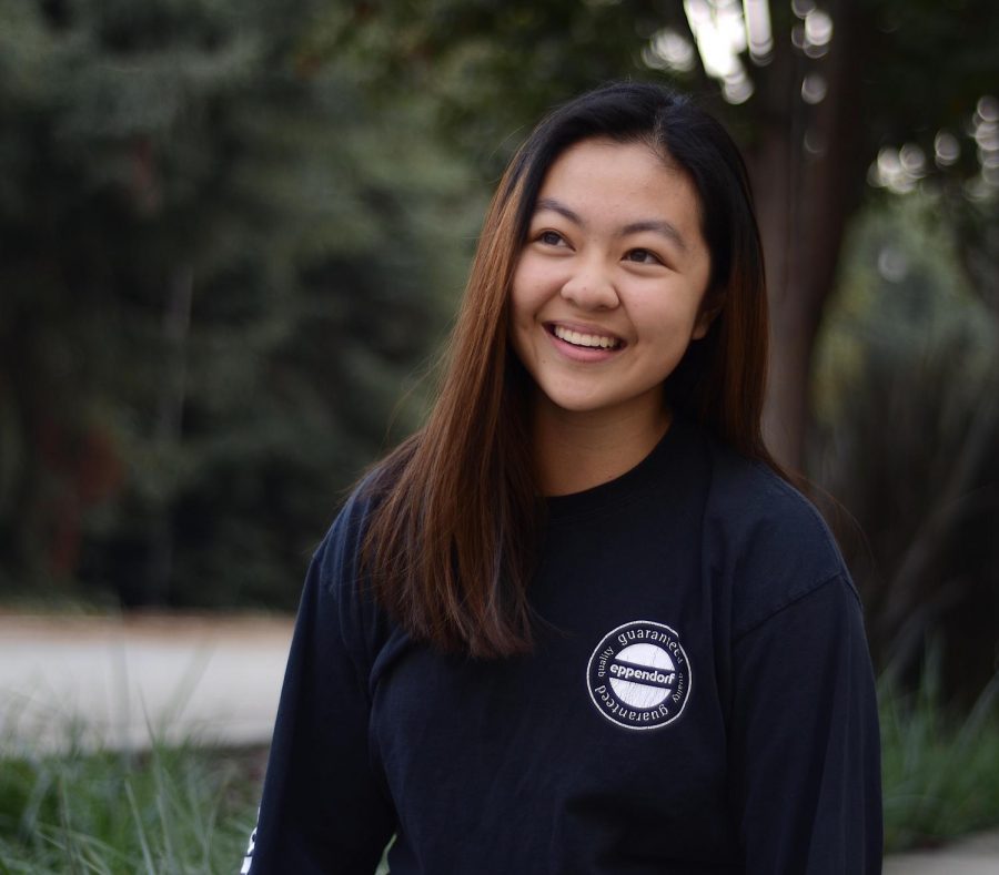 Looking back, Kaidi Dai (11) sports a navy blue long sleeve shirt with “it’s what’s inside that counts” embroidered on the back. During her free time, Kaidi enjoys thrifting, and several of her favorite pieces are thrifted.