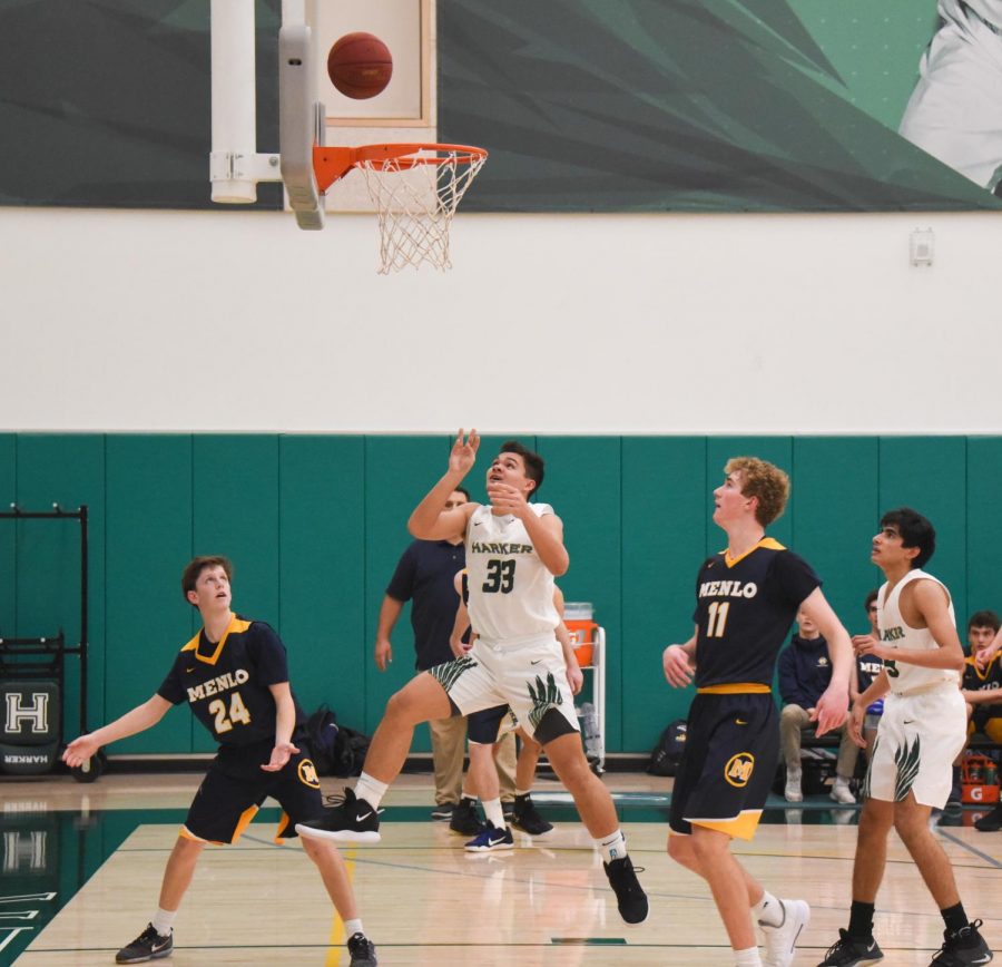 Trevor Thompson (12) scores in the paint. The boys next host The Kings Academy at 7:30 p.m. on Thursday.