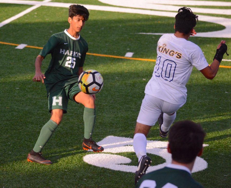 Asmit Kumar (11) bounces the ball off his knee, receiving a pass from a teammate. The boys play their next game Saturday, Feb. 2, at 11 a.m. at Woodside Priory. 
