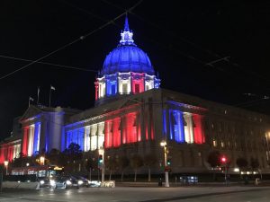 The San Francisco City Hall lit up in the colors of the American flag. Government workers across multiple federal agencies are without pay due to a government shutdown that has lasted 22 days.