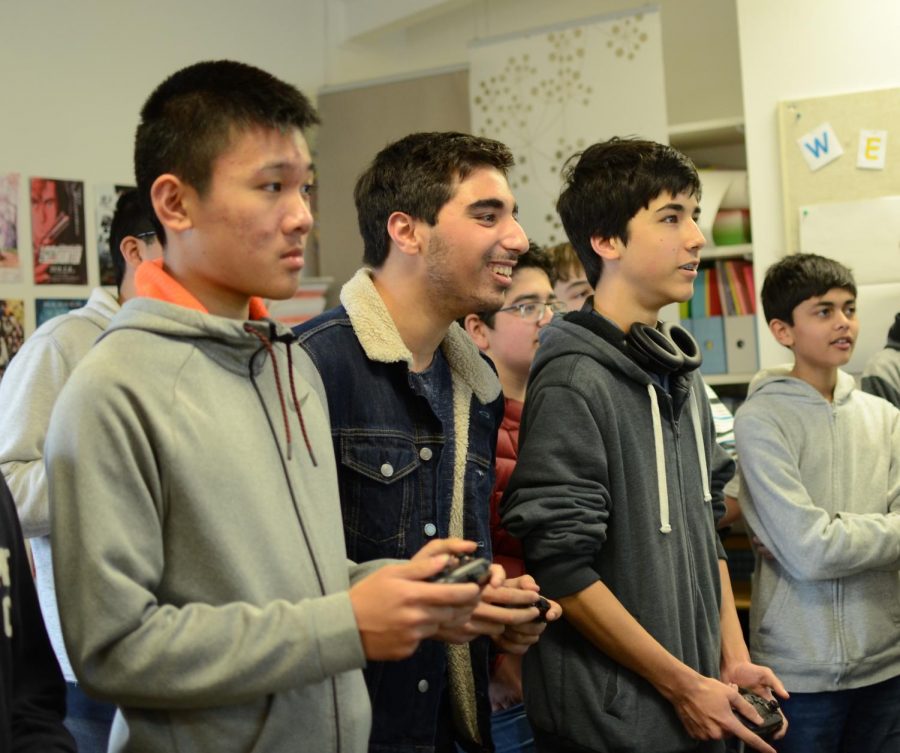 Students play in the Japanese National Honor Society (JNHS) Super Smash Bros. Ultimate video game tournament on Friday of their club week. JNHS organized thee tournament and sold traditional Japanese snacks throughout the week.