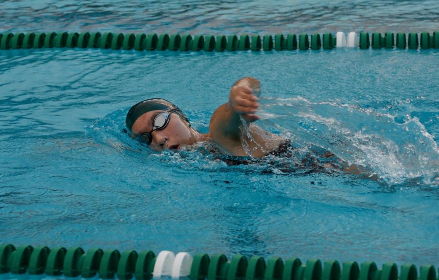 Sophomore Betsy Tian swims laps in the pool during swimming practice on Wednesday. After a strong performance at the Palo Alto Invitational on Saturday, Mar 2, the swimming team continues training for their next tournament on Mar 14, hosted at Harker.