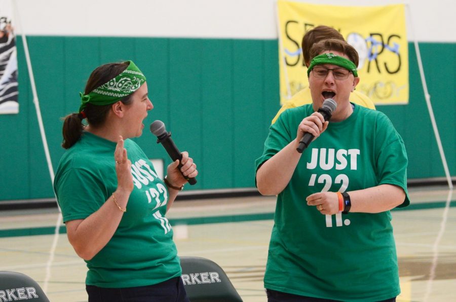 Psychology teacher Julie Turchin and Learning, Innovation and Design Director Diane Main sing a song during the Sing that Song competition between faculty members. 