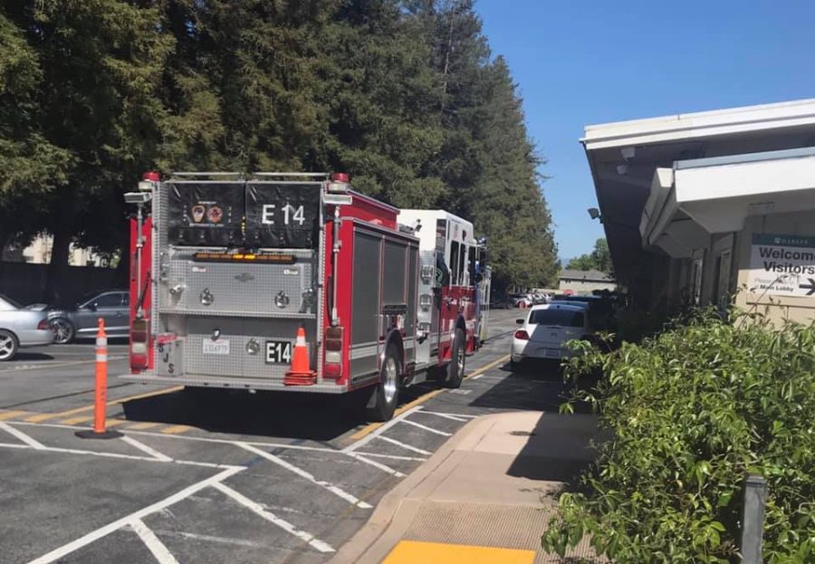 A firetruck parked in the back loading zone in response to a 911 emergency call. The firetruck and accompanying ambulance left shortly after 3:30 p.m.