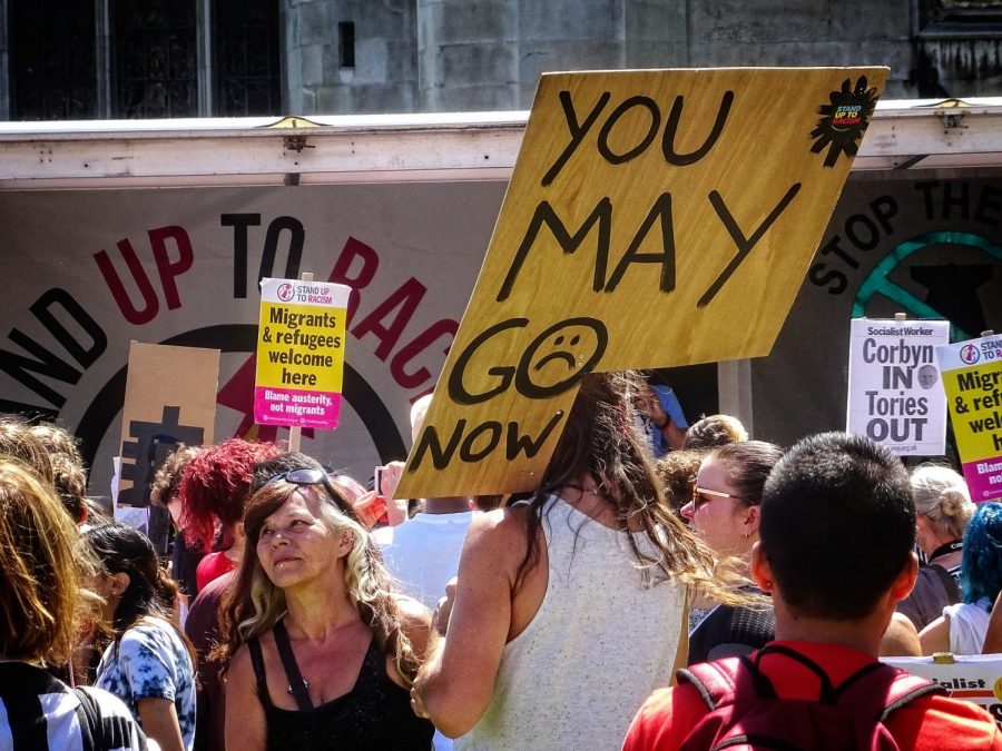 Protestors hold anti-May signs at a rally in 2017 in Londons Parliament Square. May has been shielding criticism for her adamant push for Brexit over the past three years. 