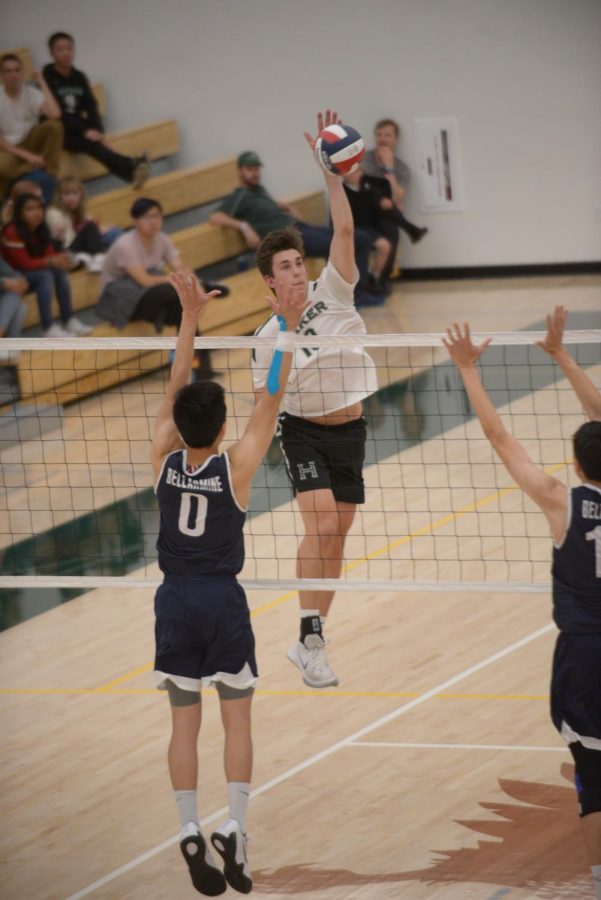 Jarett Anderson (12) hits during the second set of the game against Bellarmine. 