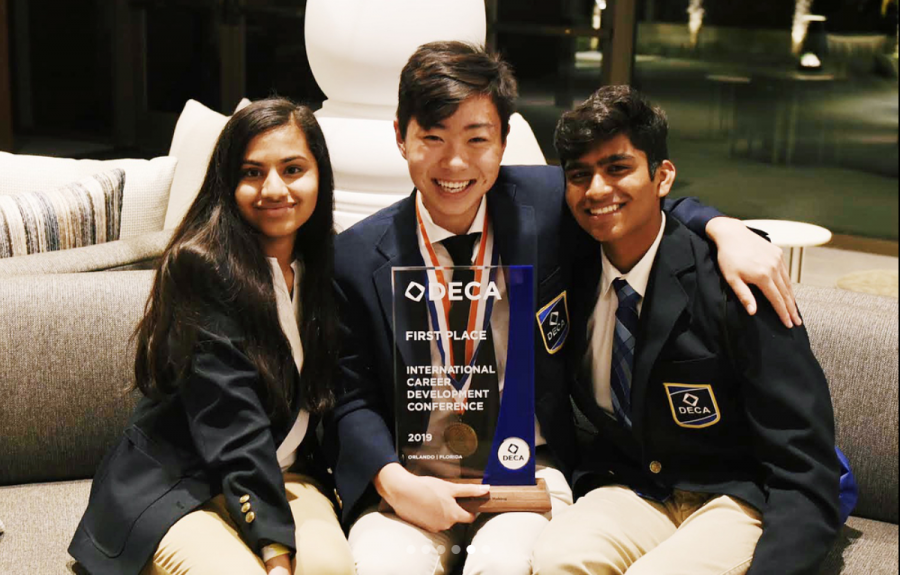 Juniors Mahi Kolla, Phil Han and Sid Dudyala pose with awards after the conference. The conference took place at Orlando, Florida. 