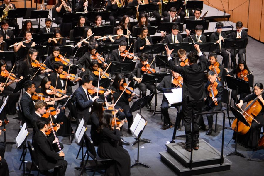 Conductor Dr. David Hart leads the upper school orchestra in a performance of Stravinskys The Firebird Suite during tonights concert, which was the last orchestra performance of the school year.