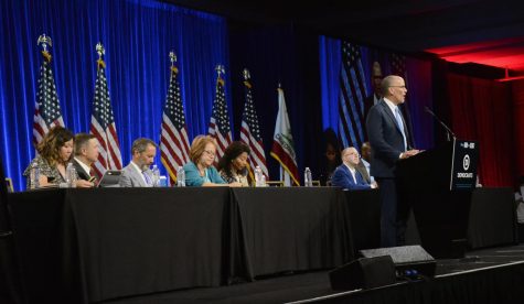 Tom Perez, chairman of the DNC, addresses DNC members and their guests during one of the Meet the Candidates sessions, when presidential candidates delivered eight-minute speeches. DNC members convened in San Francisco to participate in caucuses and committee meetings and hear speeches by Democratic candidates.