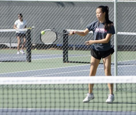 Hilari Fan (11) practices with the team at the Blackford tennis courts. The girls next play against Menlo-Atherton in the quarterfinals of the CCS tournament on Thursday. 