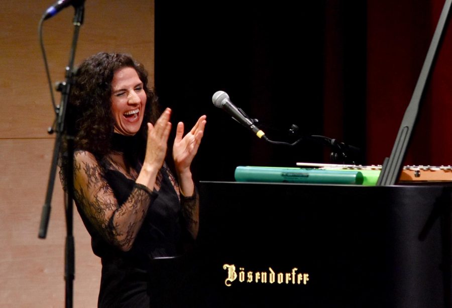 Juno Award winning jazz vocalist and pianist Laila Biali claps after performing one of her original works at the first Concert Series show last Friday night. In addition to her performance, Biali led workshops with jazz band, Downbeat and the upper school orchestra on Thursday and Friday.