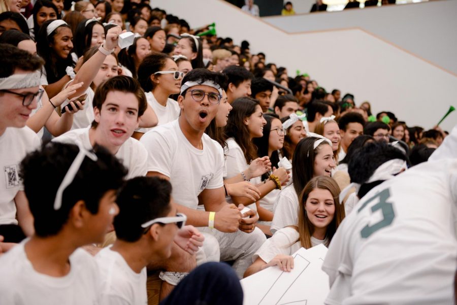 Rosh Roy (11) cheers for the Class of 2021 at the annual homecoming spirit rally on Oct. 11. The rally featured a series of events that invited the four classes to compete for spirit points, such as a lip sync competition and a relay race.