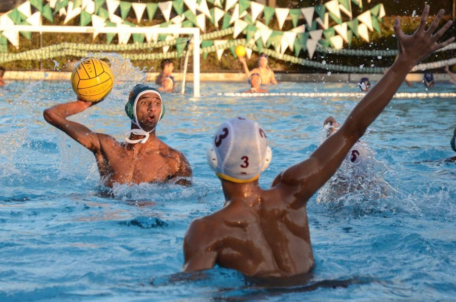 Rohan+Sonecha+%2812%29+looks+to+throw+the+ball+as+a+defender+from+the+opposing+team+raises+his+hand+to+block+the+shot.+The+boys+varsity+team+earned+fourth+place+in+the+league+tournament+after+losing+to+Cupertino.