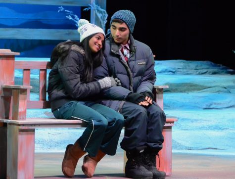 Sarina Sharma (11), playing Ginette, smiles as she rests her head on Nicky Kriplanis (11) shoulder in the prologue of the fall play. The play, Almost, Maine, was performed between Oct. 24 and Oct. 26 by two casts of students in the Patil Theater.