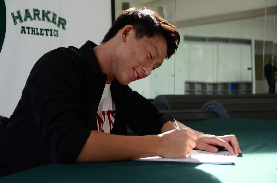 Senior+Ethan+Hu+signs+his+letter+of+intent+to+swim+for+Stanford+University.+Come+fall%2C+he+will+join+the+class+of+2024%2C+a+dream+come+true+for+him.
