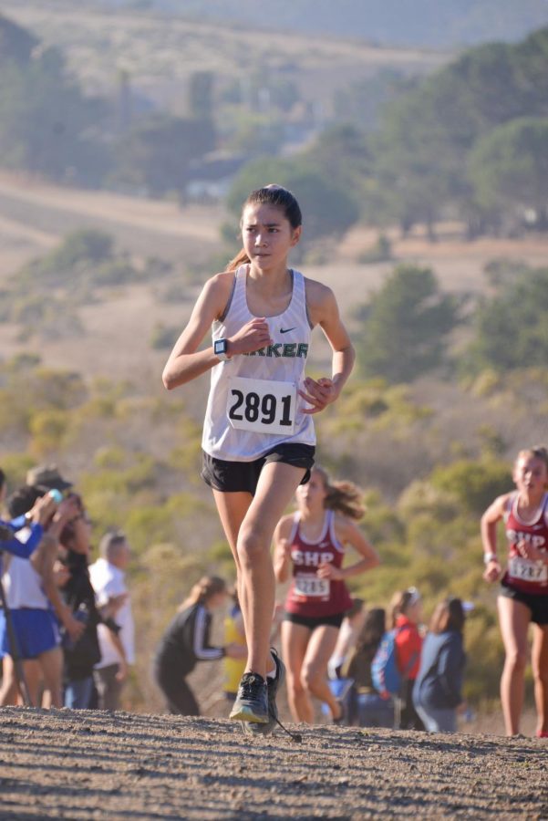 Kara Kister (9) runs at the Crystal Springs Cross Country Meet during the league championships. The varsity girls team qualified for CCS for the first time since 2015.