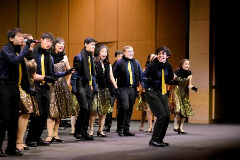 Downbeat senior Joel Morel solos during a performance of the song