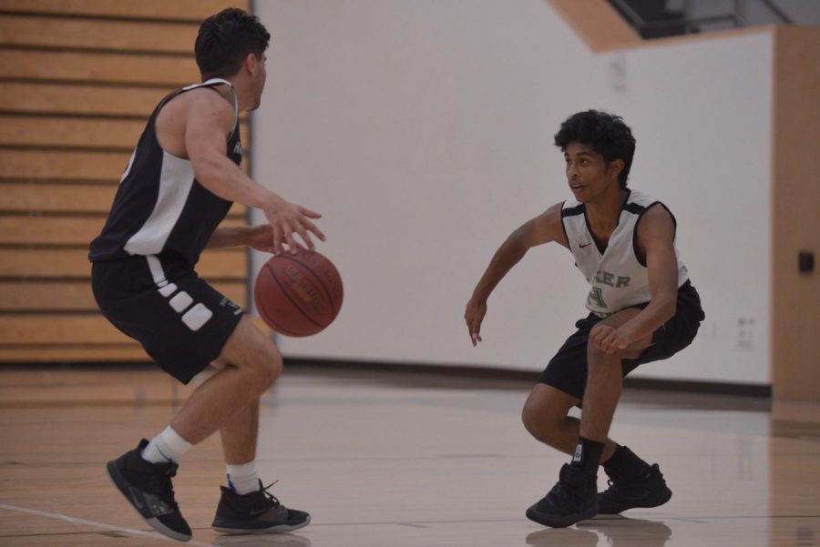 Co-captain Giovanni Rofa (12) brings the ball up the court, closely guarded by Srivishnu Pyda (11) during practice on Nov. 8. This week, the Eagles competed at the 58th Annual James Lick Invitational Tournament (JLIT) from Dec. 4 to 6, going 1-2 with narrow defeats of 48-45 and 52-48 to American High School and Fremont High School respectively, but a decisive 52-27 win against James Lick High School.
