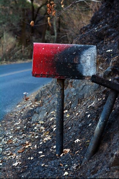 A mailbox on Chalk Hill Road bears the Kincade fire’s mark. After firefighters fully contained the fire on Nov. 3, Cal Fire lifted all evacuation orders.