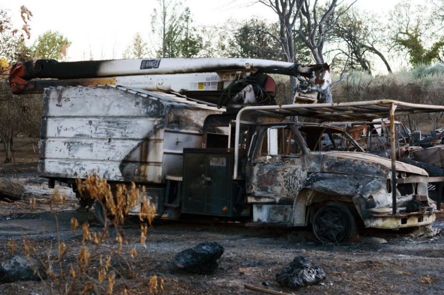 A scorched car sits parked on the side of Chalk Hill Road in Healdsburg, Sonoma County. The Kincade wildfire threatened 90,000 structures at its peak.