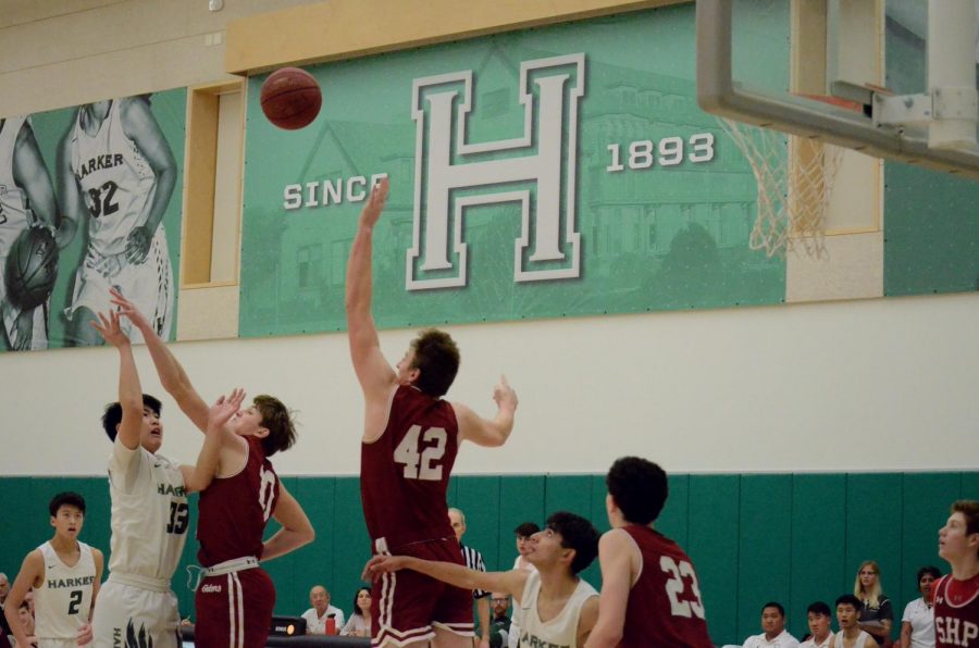 Matthew+Chen+%289%29+tosses+up+a+basket+as+his+teammates+look+on+during+the+varsity+boys+basketball+game+against+Sacred+Heart+Prep.+After+suffering+a+tough+loss%2C+the+Eagles+are+currently+0-2+in+league+and+6-6+overall.
