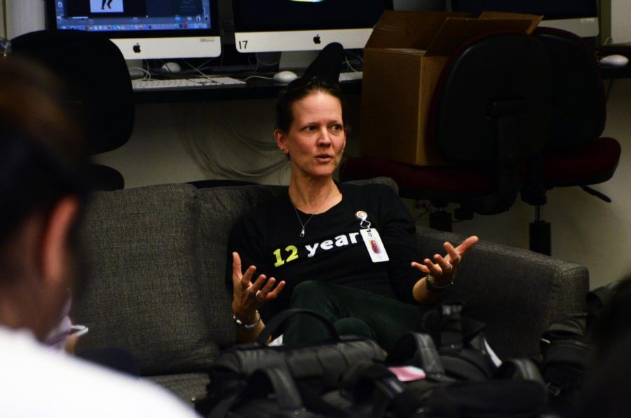 Biology teacher Dr. Kate Schafer speaks to editors in the journalism room about 2019-nCOV after school. The Santa Clara County case is the seventh confirmed case in the U.S., with two confirmed cases in Southern California, one in Washington state, one in Arizona and two in Illinois. 