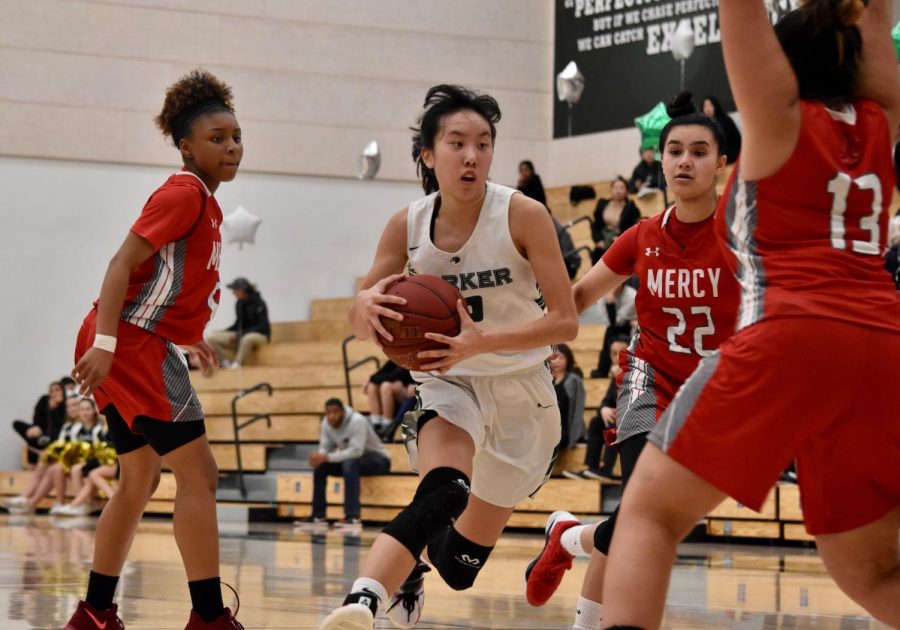 Alexa Lowe (10) drives to the basket during the first half of the senior night match on Friday. This loss brings their overall record to 11-11 and their league record to 6-4. 