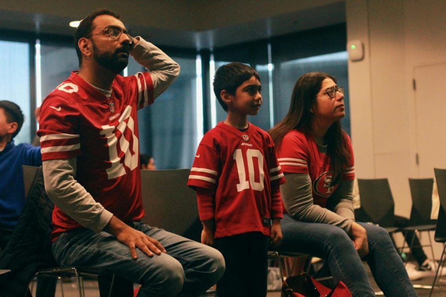 A man holds his head in disbelief after the referees make a disappointing call for the 49ers in the second quarter of the game.
