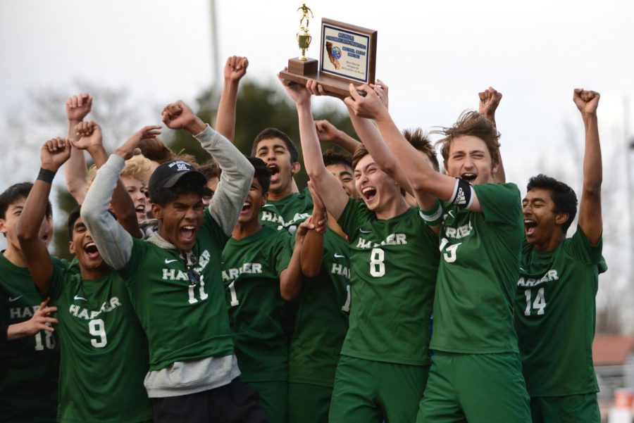 The+varsity+boys+soccer+team+celebrates+after+clinching+their+first+CCS+championship+in+school+history+after+a+win+in+penalty+kicks+against+St.+Francis+on+Saturday.+%E2%80%9CThe+fact+that+four+years+ago+we%E2%80%99d+only+been+to+CCS+once.+Then+we+start+going+to+CCS%2C+we+start+making+it+further+and+further.+And+now+we%E2%80%99re+the+CCS+champions%2C+that%E2%80%99s+insane%2C%E2%80%9D+goalie+Laszlo+Bollyky+%2810%29+said.+